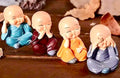 Set of 4 Adorable Baby Buddha Monk Statues